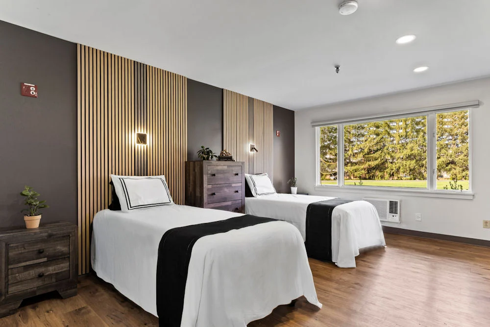 Peaceful room with two beds designed for healing in anxiety therapy treatment