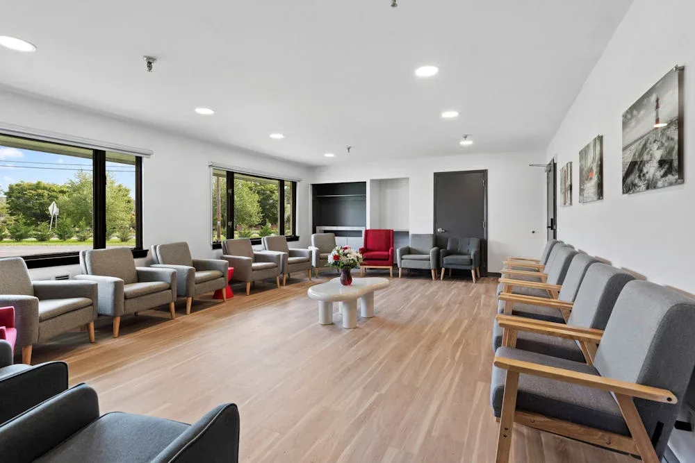 Therapy room with chairs inside an anxiety treatment center for patients