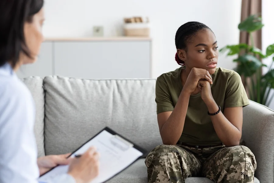 a veteran looking away in a therapy session