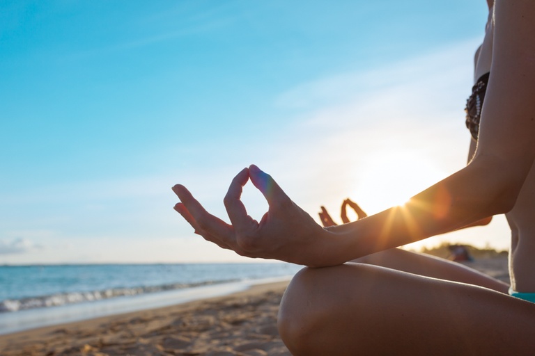 An individual practicing meditation techniques for recovery after detox