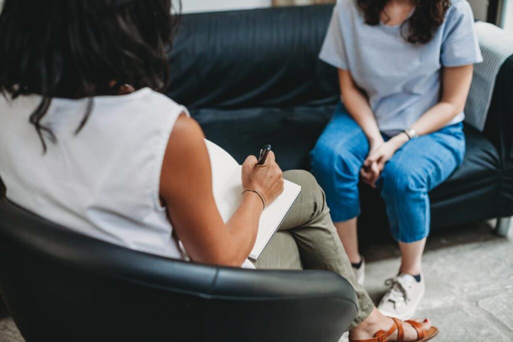 Two women in therapy learning how dialectical behavior therapy helps with anxiety