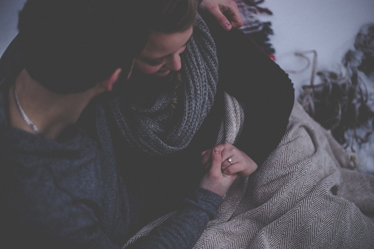 Man comforting partner affected by personality disorder
