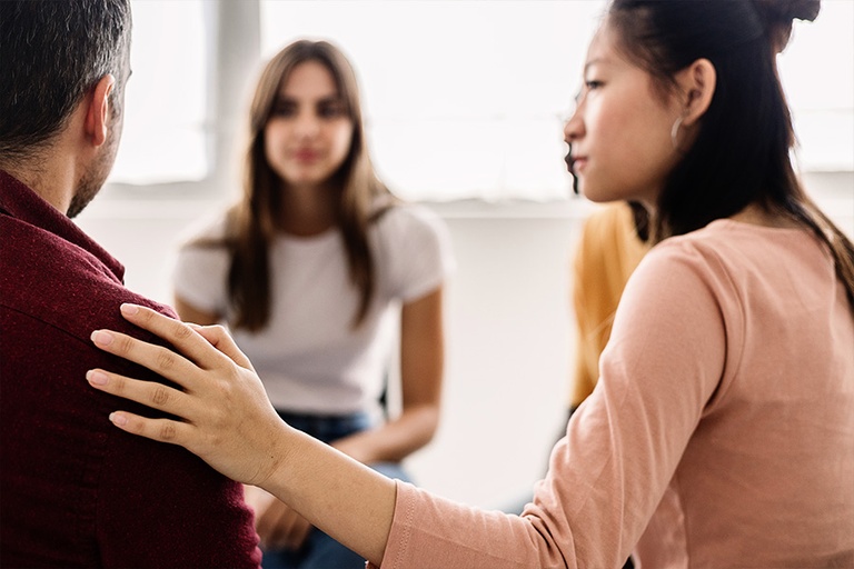 Group therapy discussing how intensive outpatient programs can help