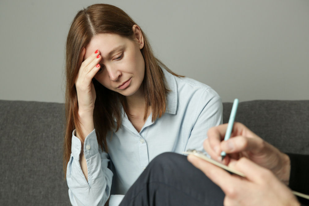 A woman seeking help from professionals for her anxiety and depression