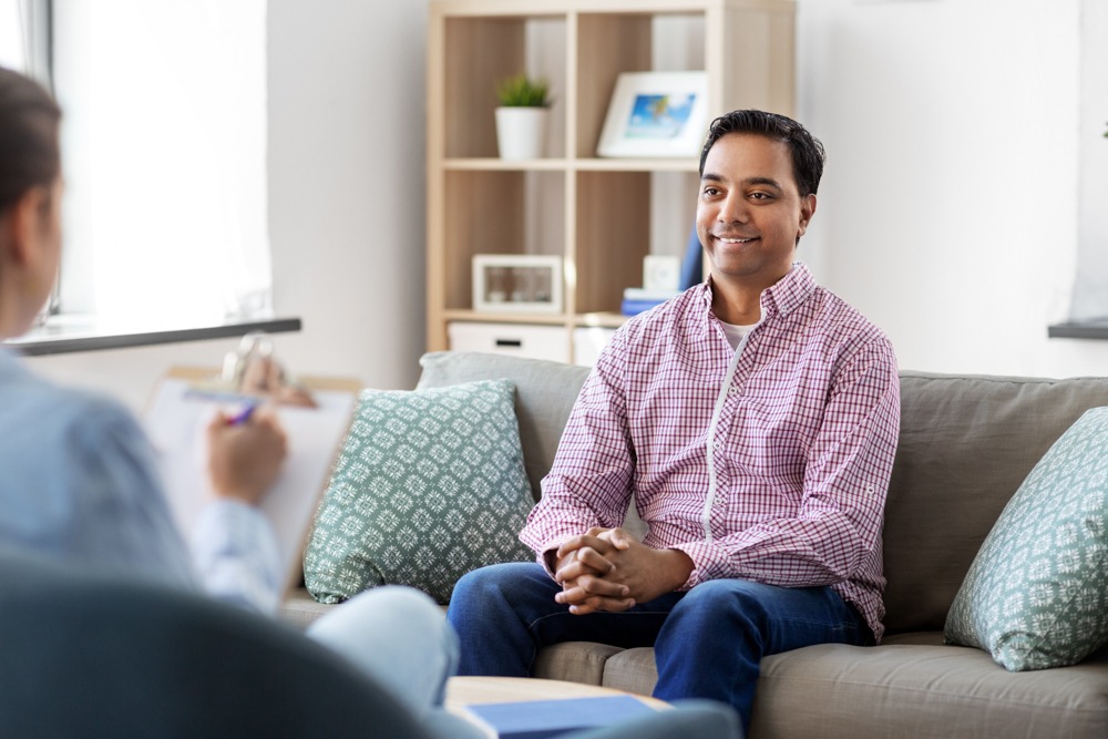 Man in therapy learning how alcohol affects kidneys