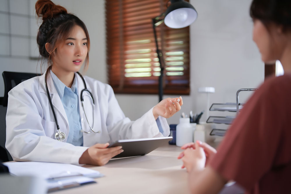 a health expert speaking to her patient