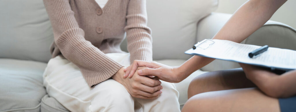 a-woman-being-comforted-in-session