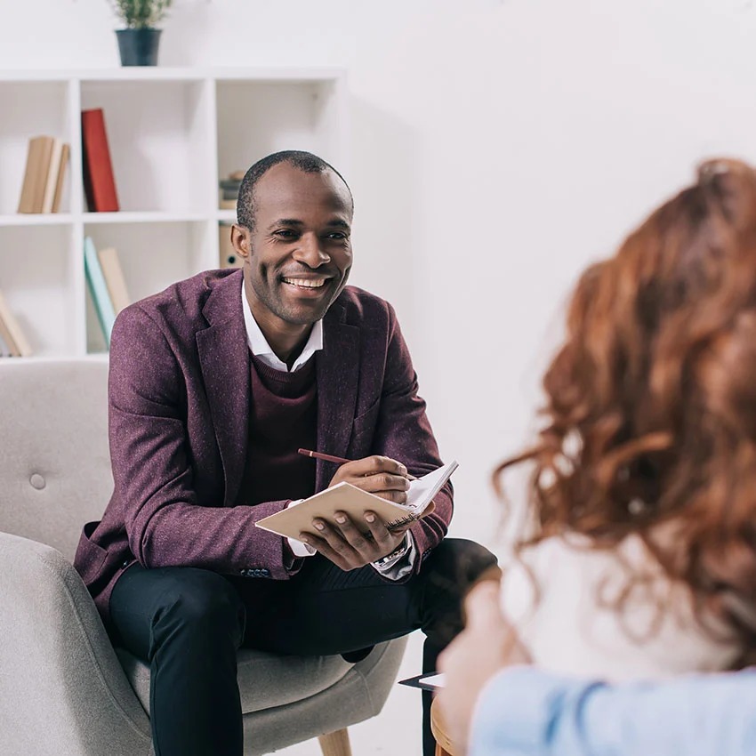 Therapist supporting client during addiction detox counseling session in Pennsylvania.