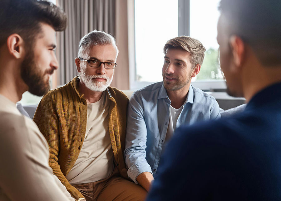 a group of males in therapy