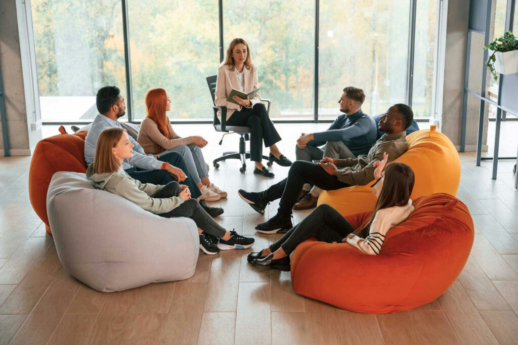 a group of individuals in therapy