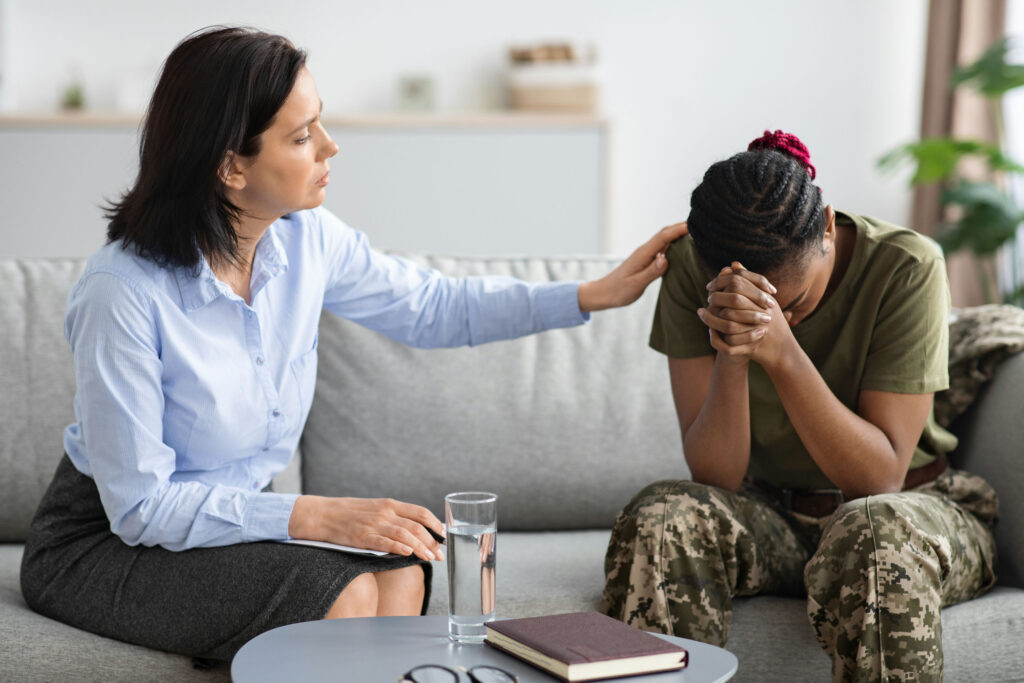 a veteran woman being comforted